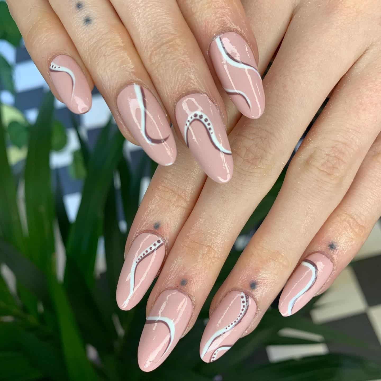 5. Fine White Trails with Dark Outline Detailing - squiggly nail ideas