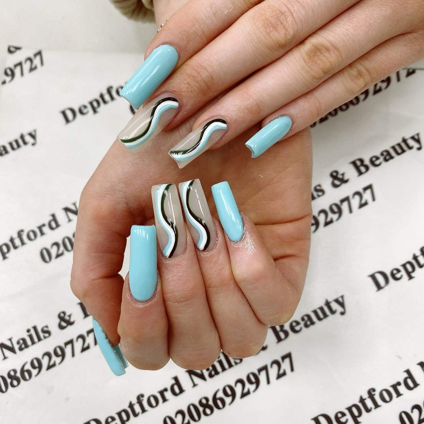 10. Aqua & Nude Split Waves on Coffin Nails - squiggly nail ideas