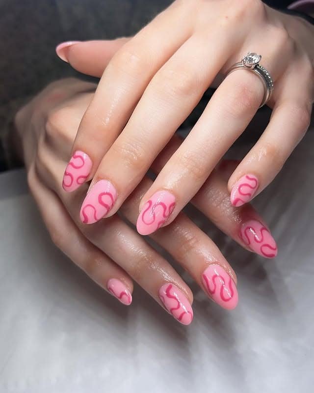 11. Pink Jelly Base with Hot-Pink Curved Lines - squiggly nail ideas
