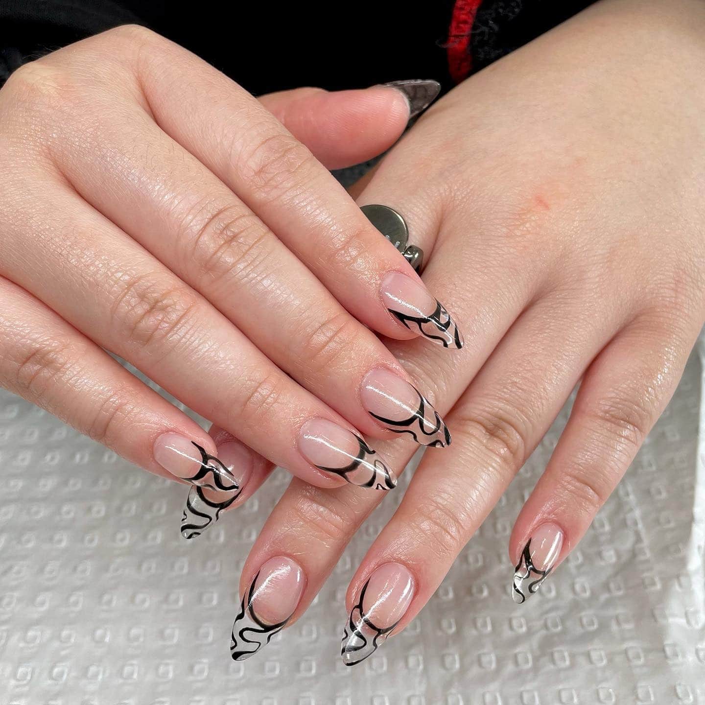 13. Monochrome Black Squiggle Tips on Sheer Nude - squiggly nail ideas