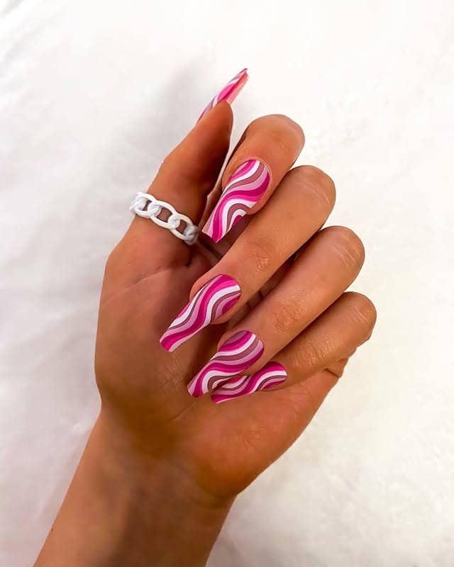 14. Pink Wave Cascade on Long Coffin Nails - squiggly nail ideas
