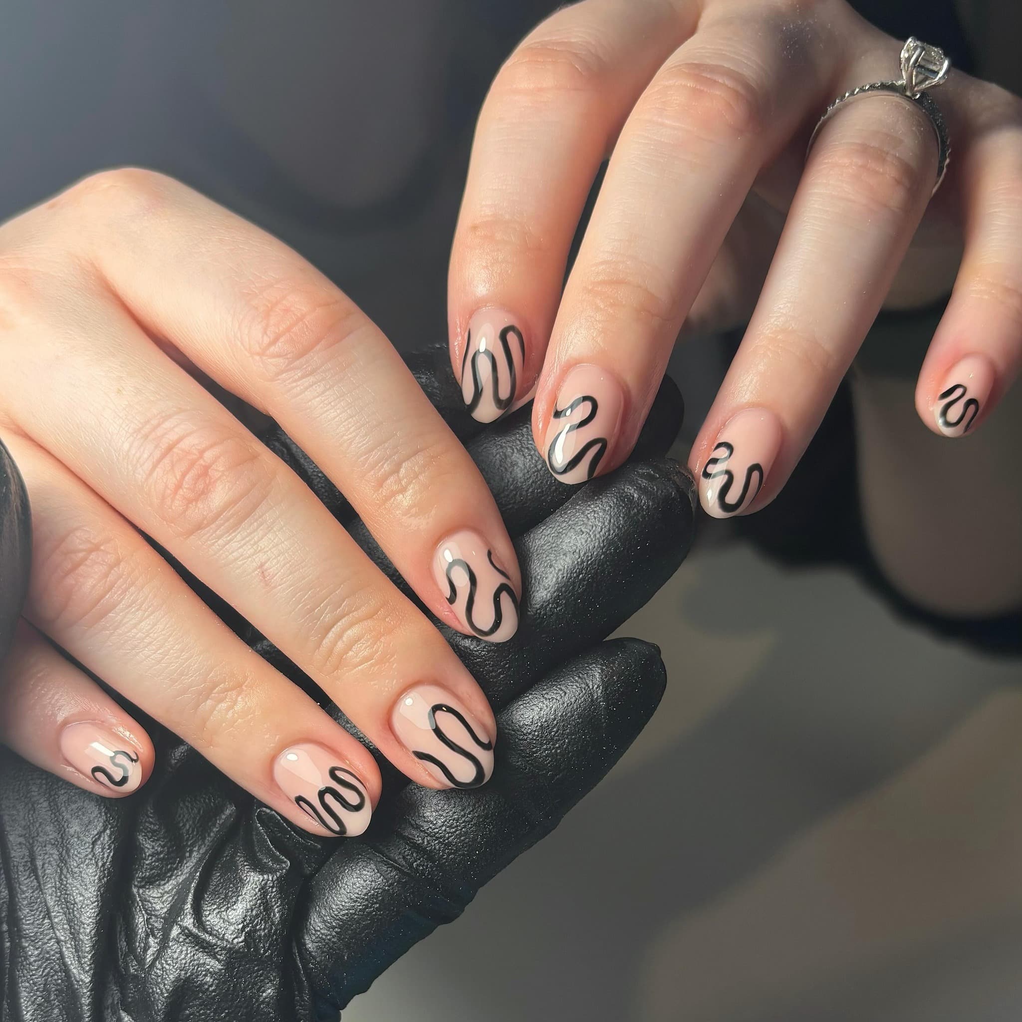 16. Black Ink Squiggles on Blush Almond Nails - squiggly nail ideas