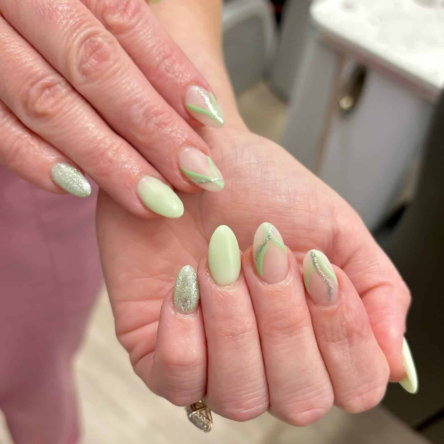 18. Pistachio Green Mix with Glitter Waves - squiggly nail ideas