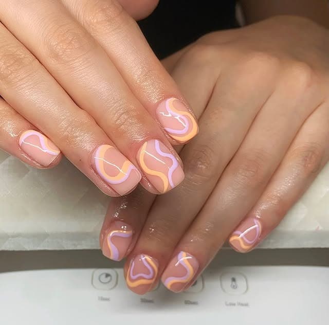 20. Pastel Peach, Lilac, and Yellow Swirls on Short Nails - squiggly nail ideas