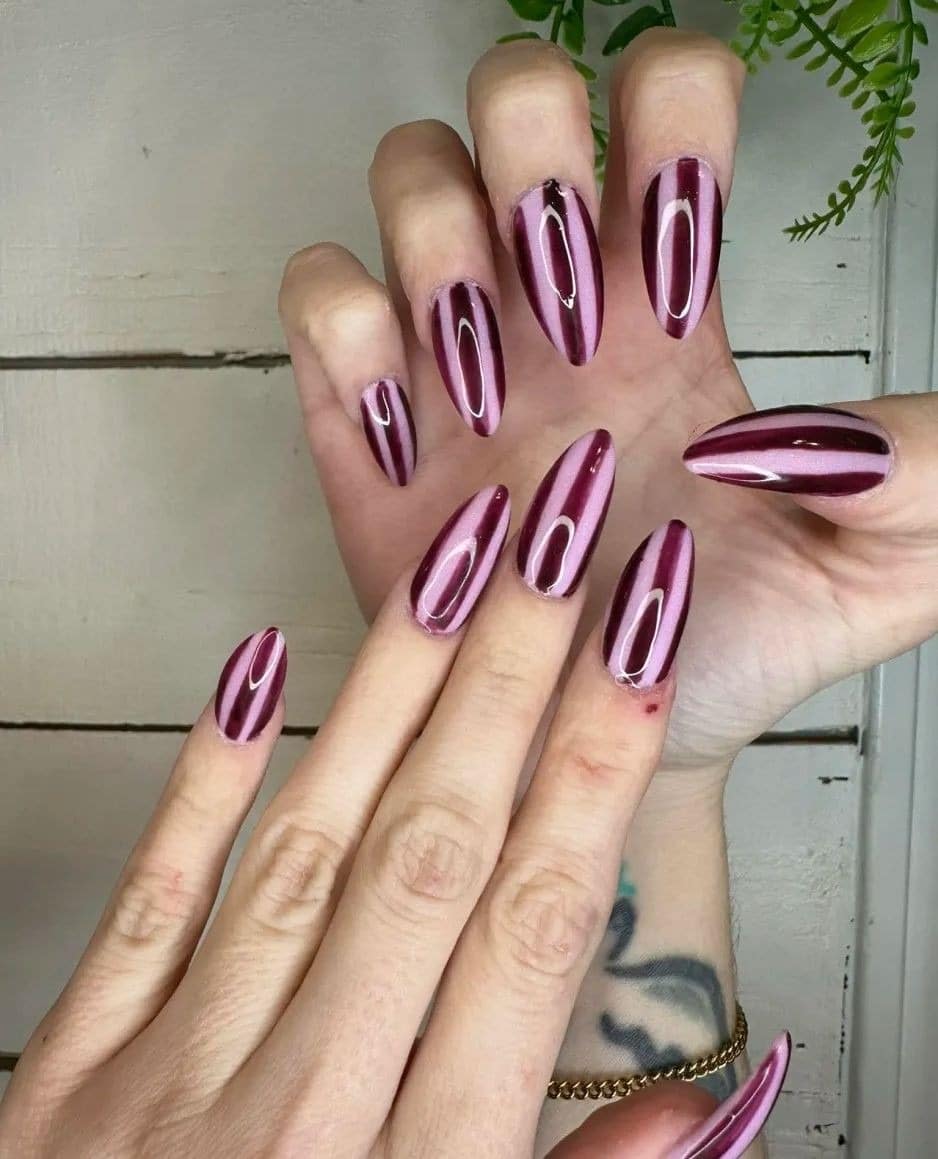 4. Metallic Plum Dimensional Stripes - striped nail ideas