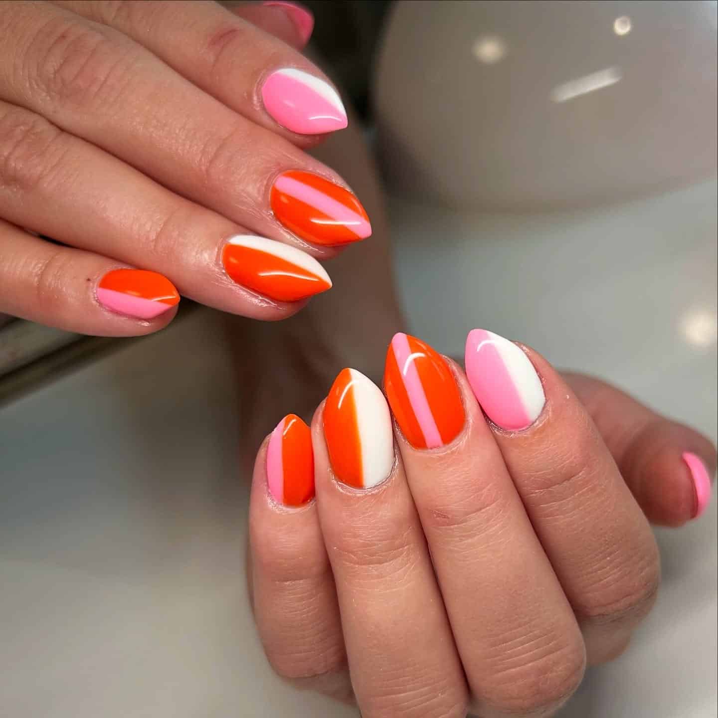 5. Neon Orange, Pink & White Stripe Play - striped nail ideas
