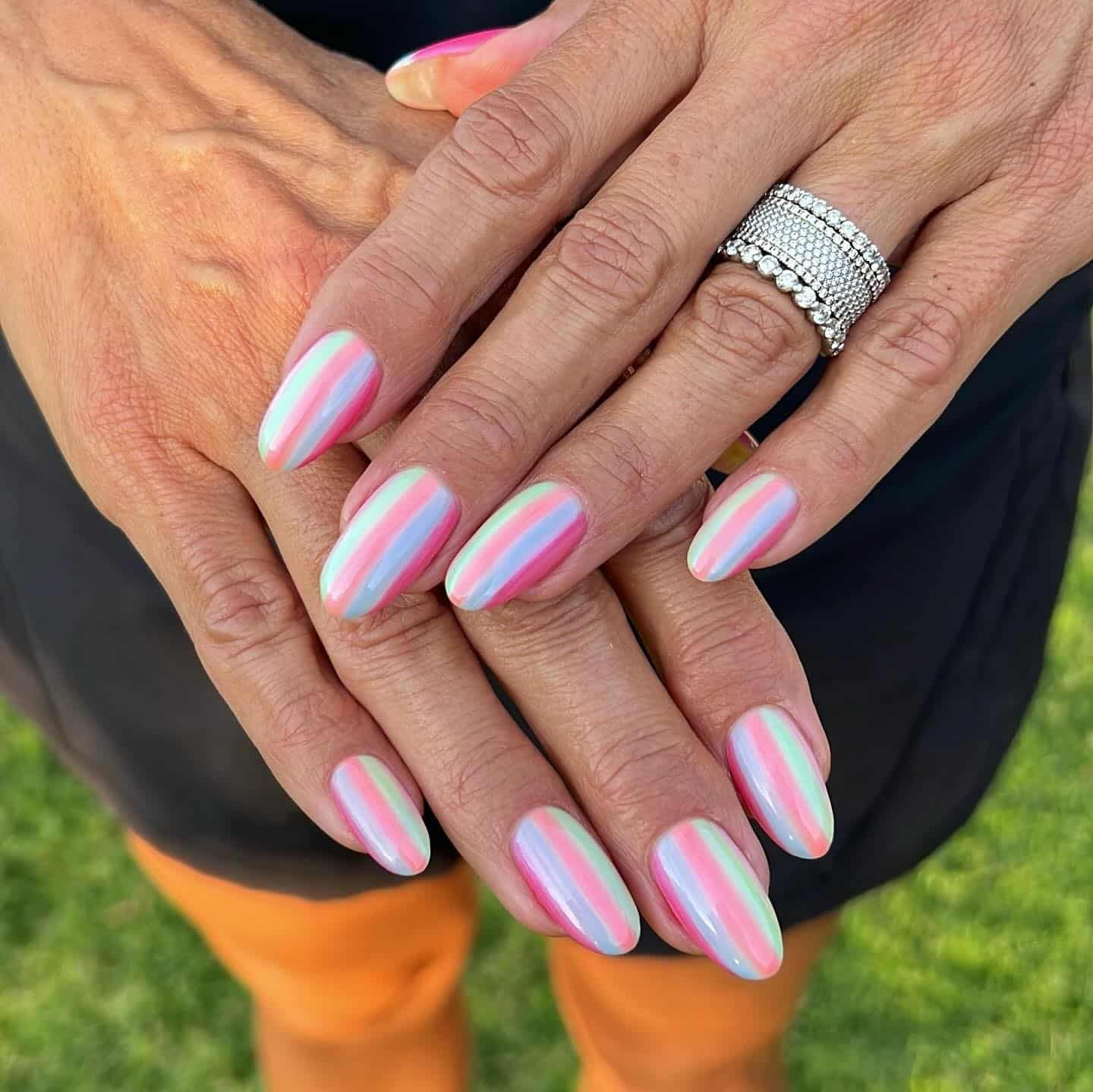 7. Pastel Shell Iridescent Stripes - striped nail ideas