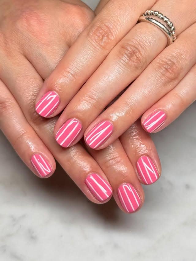12. Bubblegum Pink With Crisp White Linework - striped nail ideas