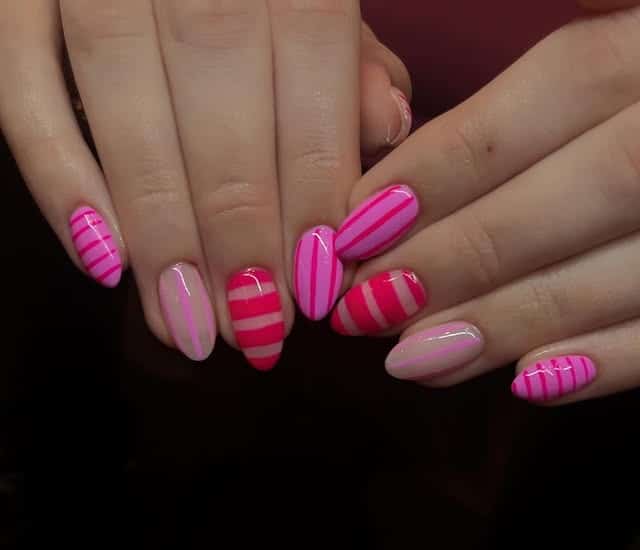 15. Vivid Pink Gradient Striped Mix - striped nail ideas