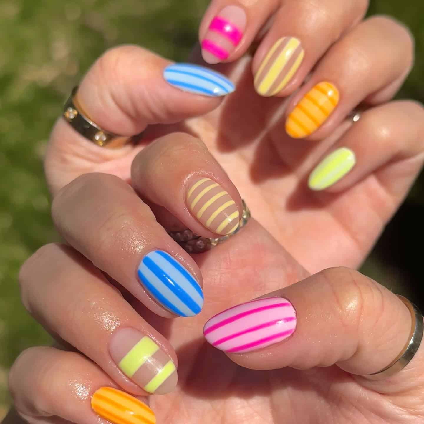 21. Neon Summer Mixed Stripe Medley - striped nail ideas