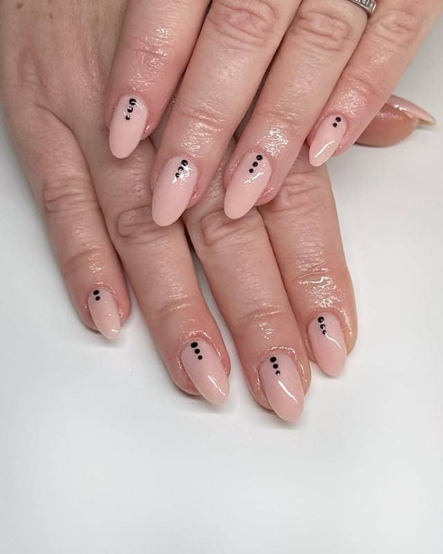 2. Blush Nude Nails with Minimal Dot Art - subtle nail ideas