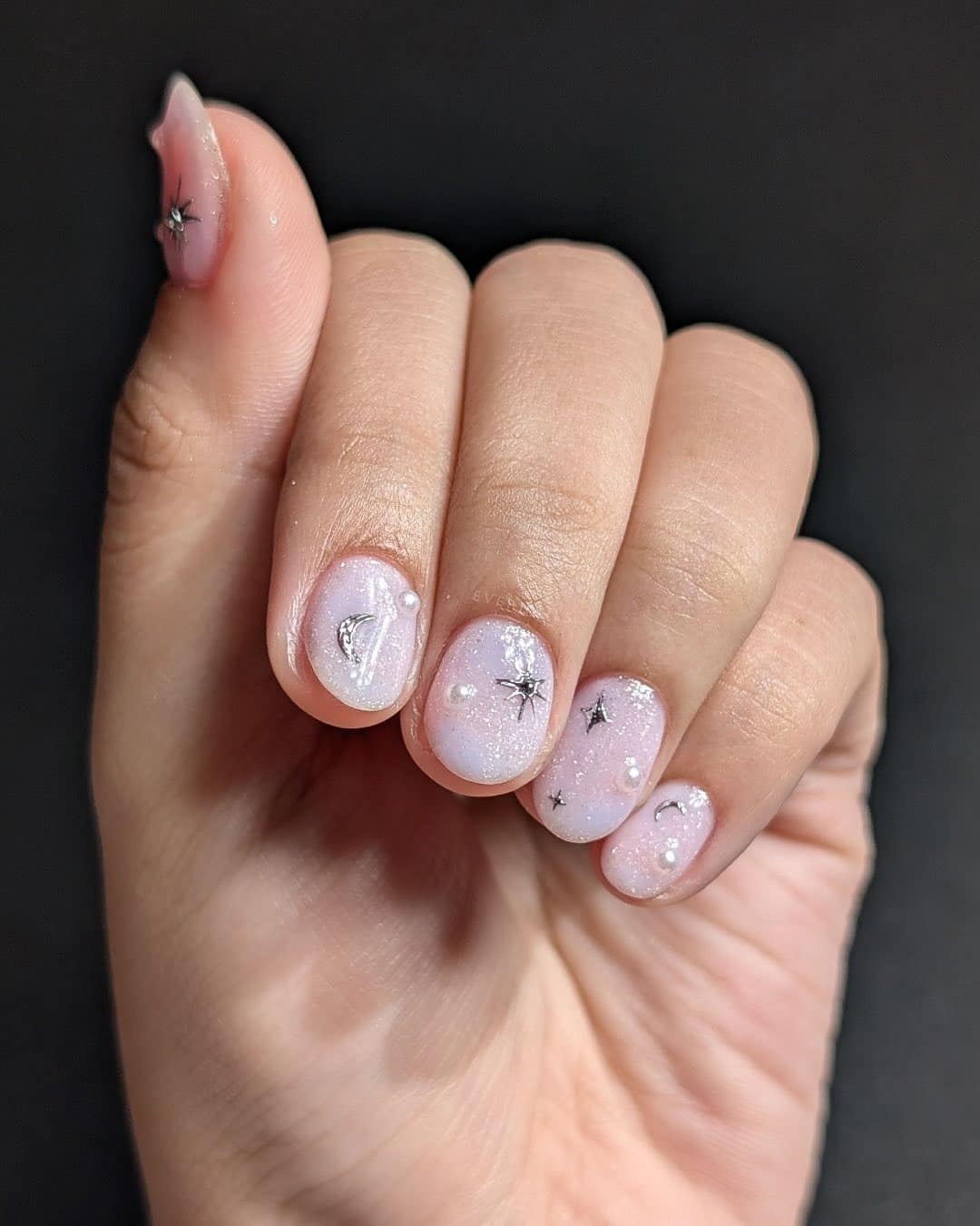 5. Icy Pearl Short Nails with Celestial Accents - subtle nail ideas