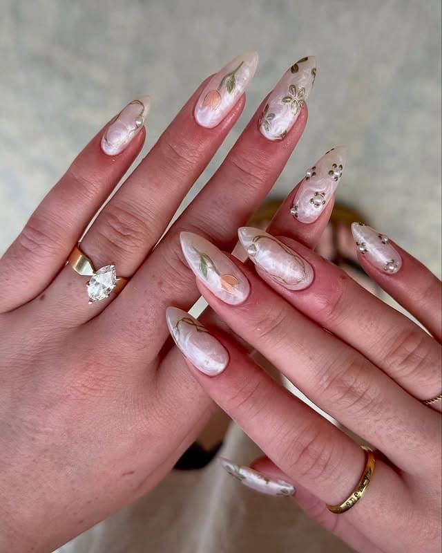 10. Milky Floral Sculpted Nails - subtle nail ideas