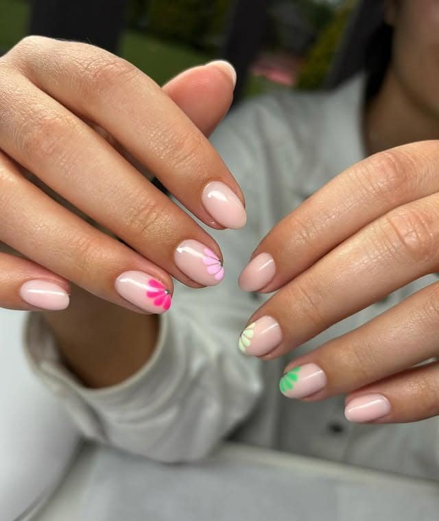 11. Pastel Bloom Accent Nails on Soft Nude - subtle nail ideas
