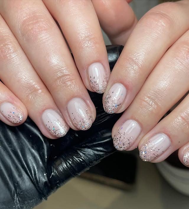 17. Sheer Pink Glitter-Gradient Nails - subtle nail ideas
