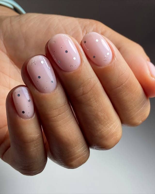 18. Soft Pink Nails with Tiny Charcoal Speckles - subtle nail ideas
