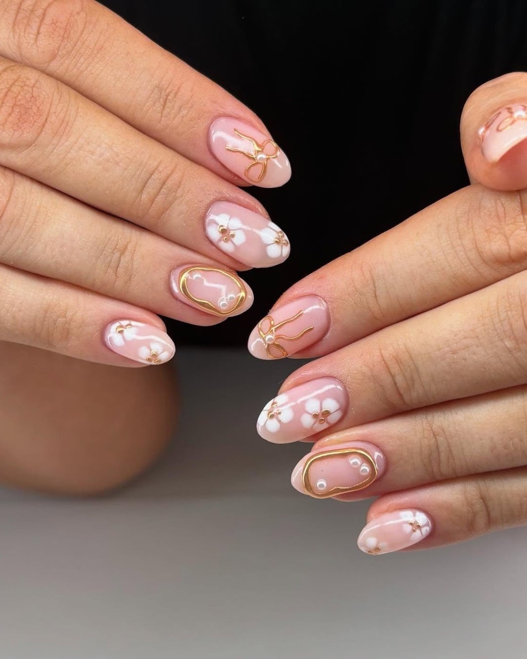 19. White Floral and Gold Ribbon Nails on Rosy Nude - subtle nail ideas