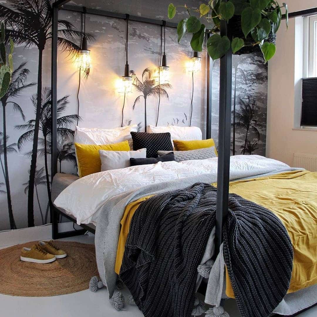11. Palm-Lit Canopy with Golden Layers - black and yellow bedroom ideas