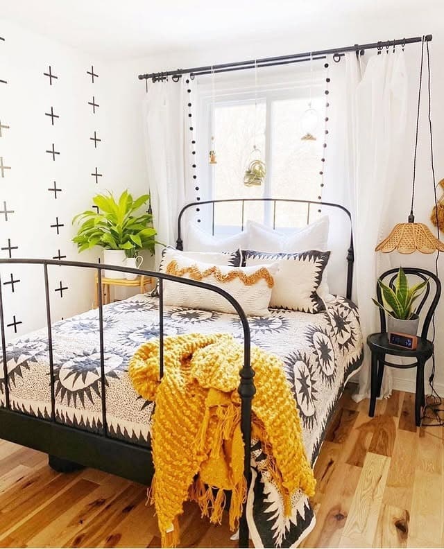 17. Bright Cross-Patterned Retreat with Sunny Textures - black and yellow bedroom ideas
