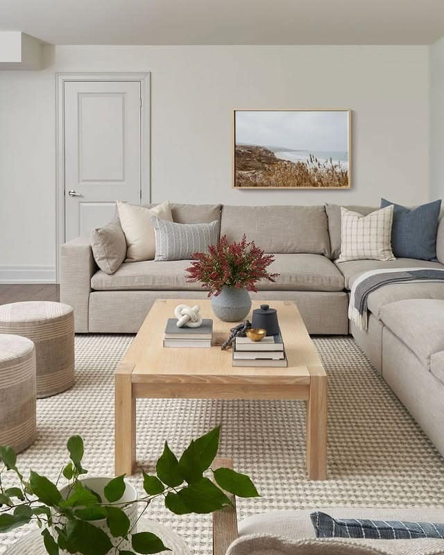 4. Airy Light-Wood Retreat with Coastal Influence - basement living room ideas