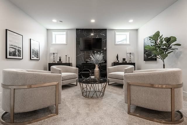 5. Chic Basement Conversation Zone in Warm Neutrals - basement living room ideas