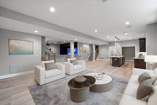 17. Open-Concept Basement in Cool Grays and Light Oak - basement living room ideas