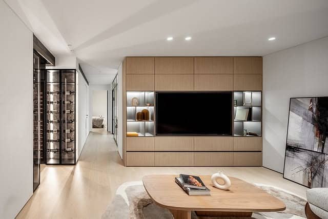 18. Contemporary Media Wall with Clean Lines - basement living room ideas