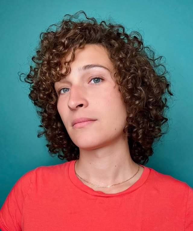 2. Short Curly Layers with Natural Chocolate Color - Layered Curly Hairstyles