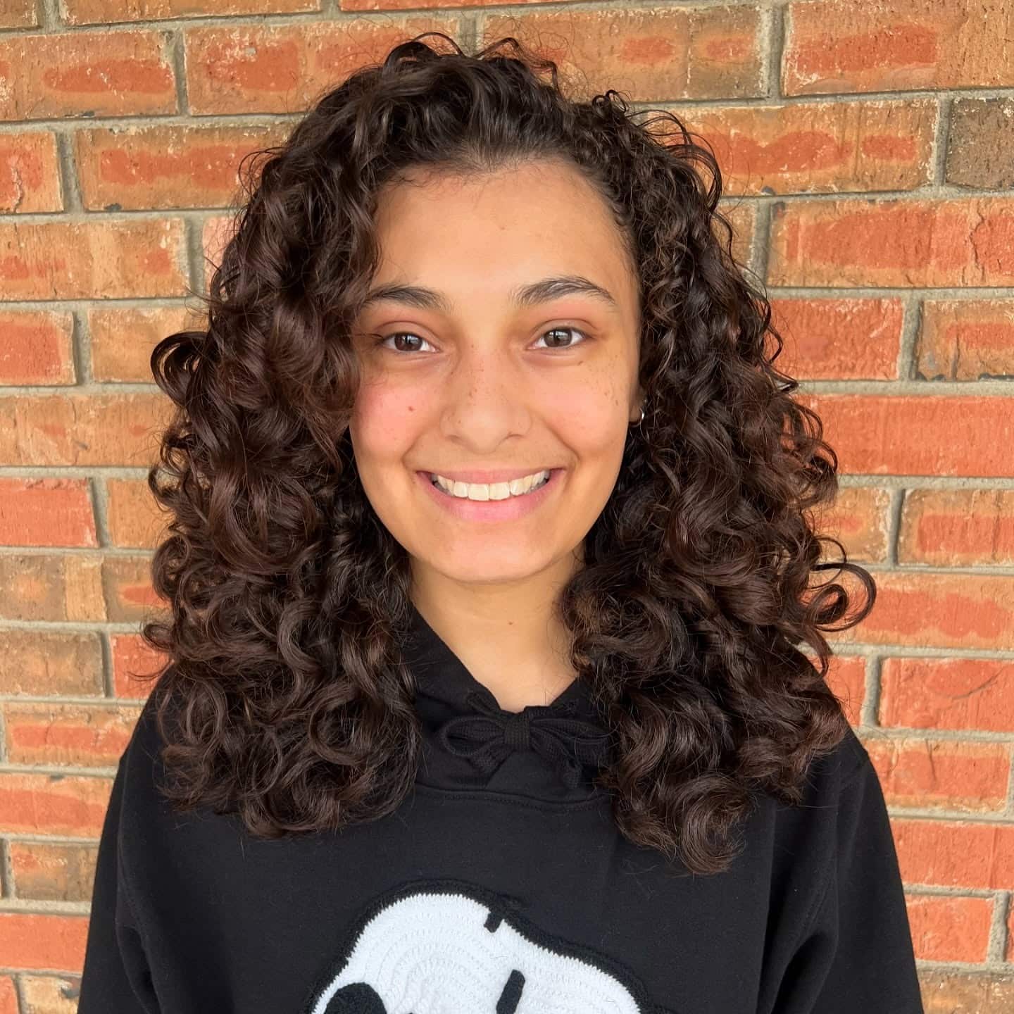 5. Loose Spiral Layers with Dimensional Dark Brown - Layered Curly Hairstyles