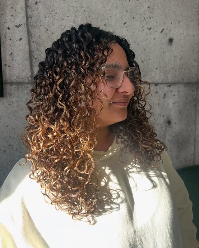 13. Dimensional Curly Layers with Light Caramel Ends - Layered Curly Hairstyles