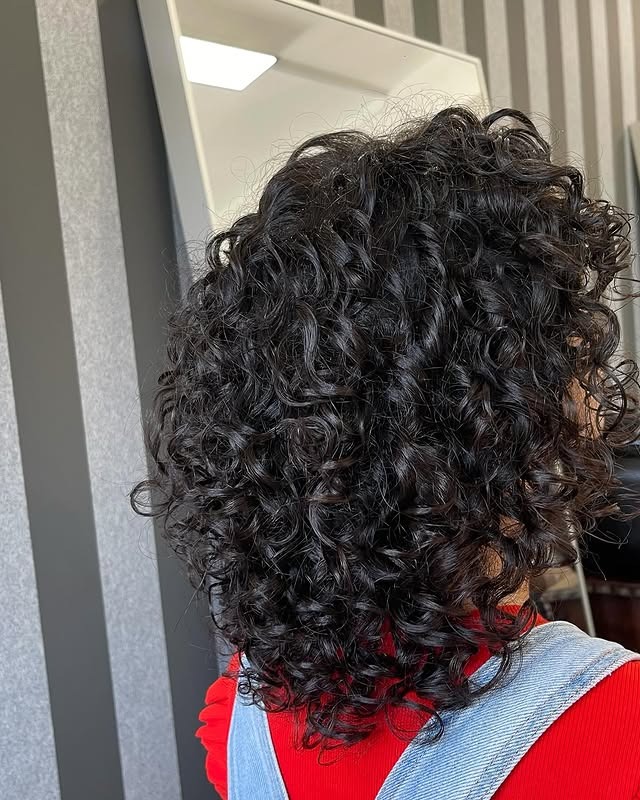 15. Short Layered Curls in Dark Espresso Brown - Layered Curly Hairstyles