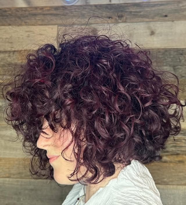 20. Short Curly Bob with Plum-Brown Color - Layered Curly Hairstyles