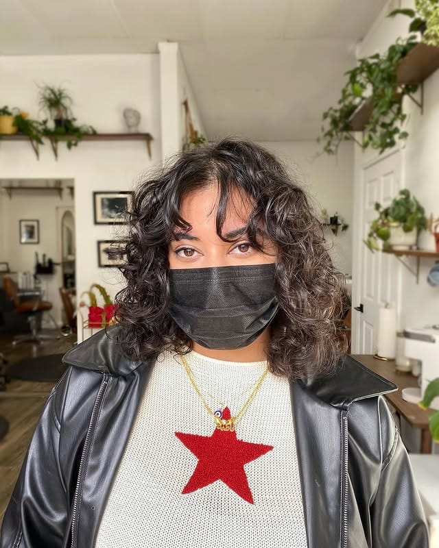 21. Short Curly Layers with Soft Fringe in Dark Brown - Layered Curly Hairstyles