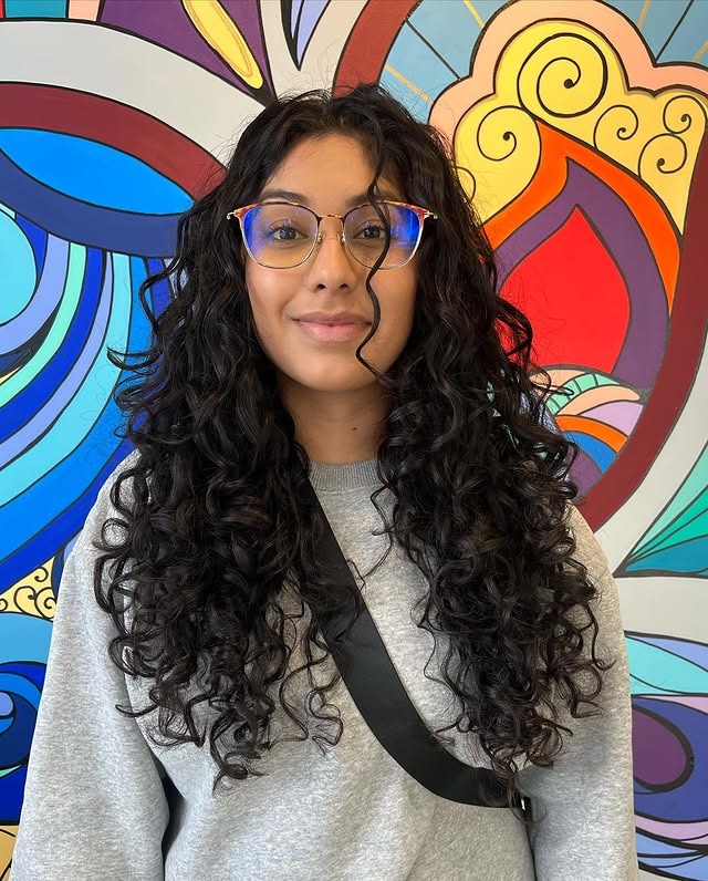 22. Long Defined Curly Layers in Deep Black - Layered Curly Hairstyles