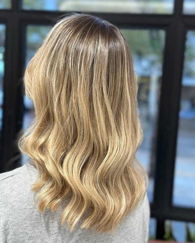 9. Soft Sand Blonde with Smooth Sculpted Waves - Old Money Hair