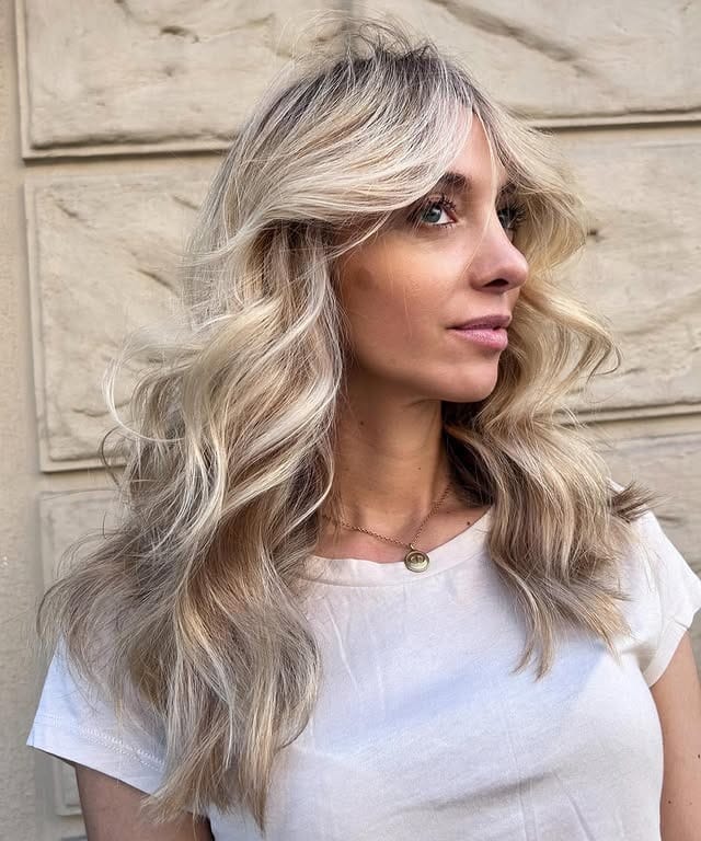13. Soft Beige Blonde Waves with Feathered Face Frame - Old Money Hair