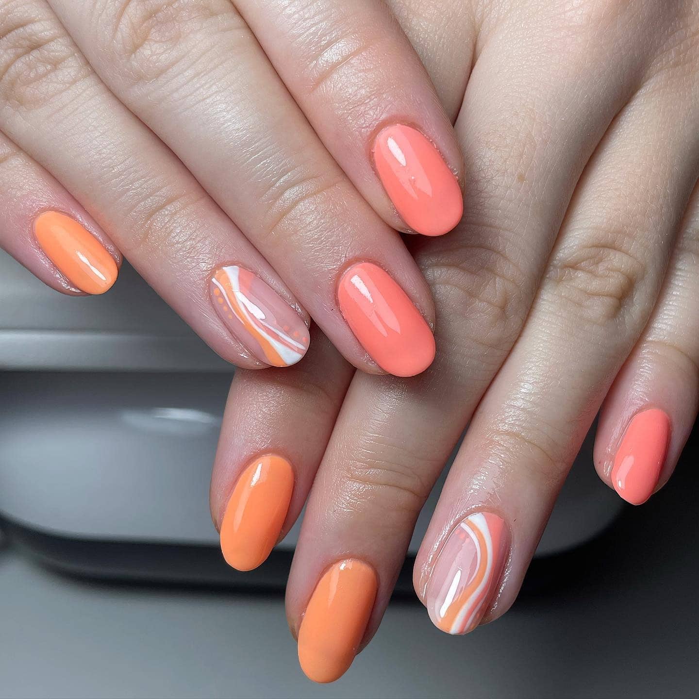 1. Soft Coral Waves on Almond Tips - summer coral nail ideas
