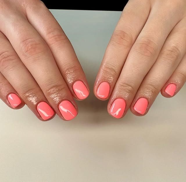 12. Glossy Coral Round Nails - summer coral nail ideas