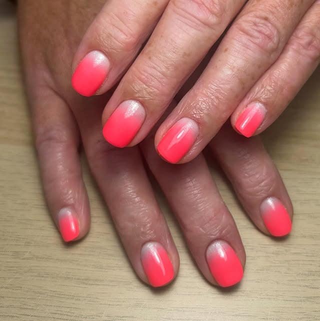 14. Coral Ombre with Pearl Sheen - summer coral nail ideas