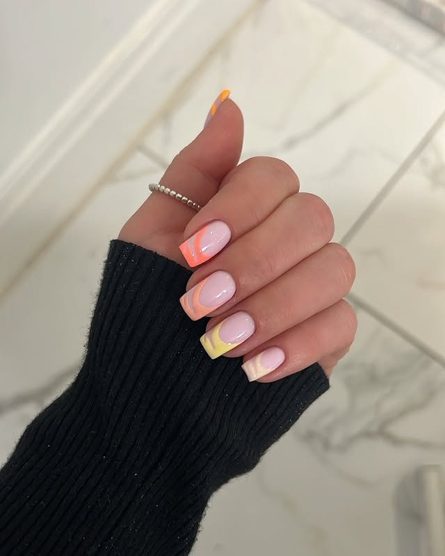 20. Pastel Coral Swirl French Tips - summer coral nail ideas