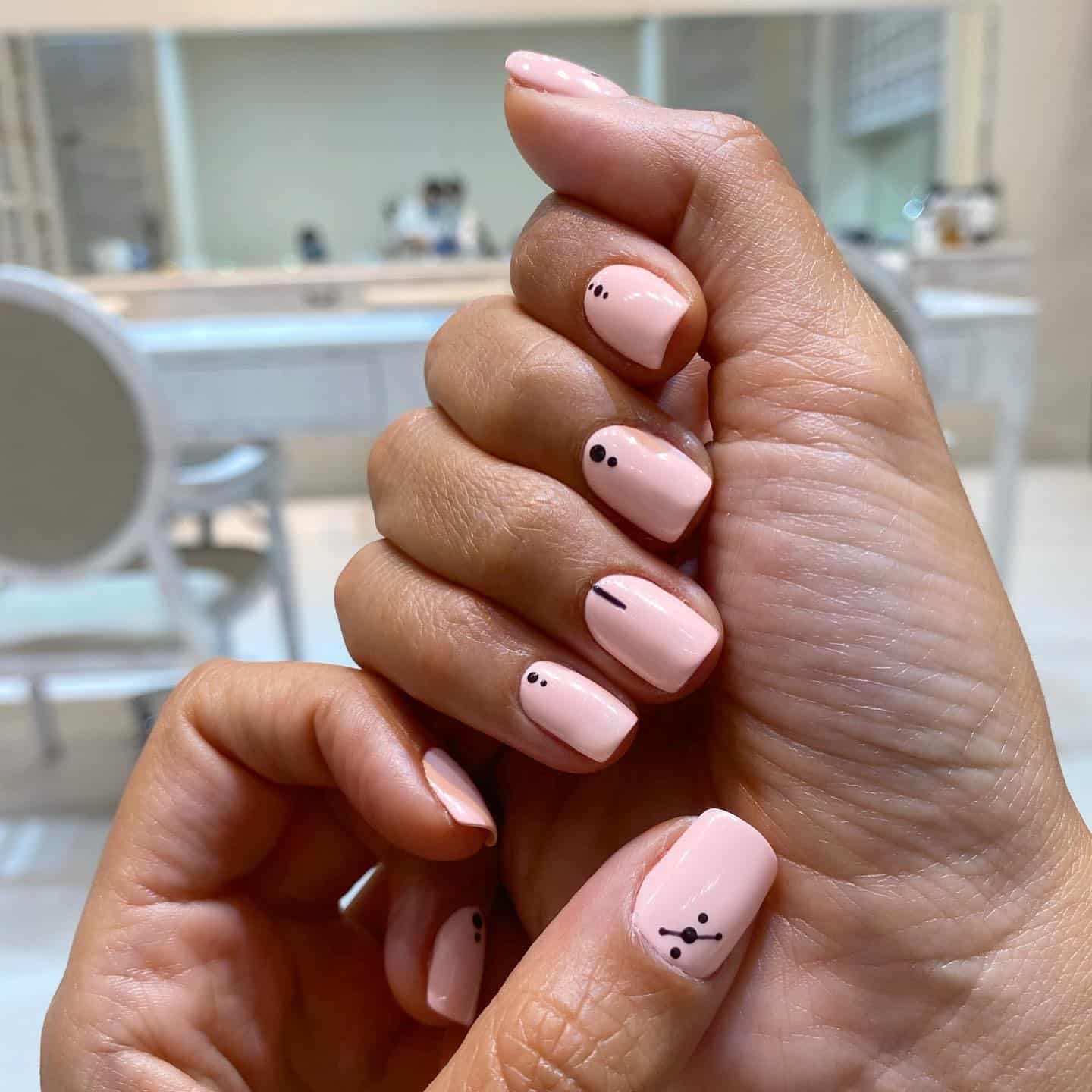 21. Soft Coral Minimalist Dot Art - summer coral nail ideas