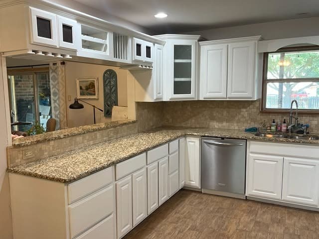 13. Crisp White U-Shaped Makeover - kitchen cabinet paint ideas