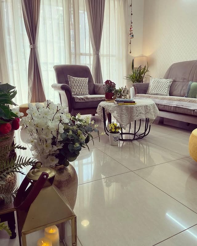 7. Soft Grey Living Room with Floral Touches - indian style living room ideas