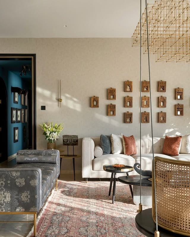 16. Pastel and Terracotta Living Room with Soft Lighting - indian style living room ideas