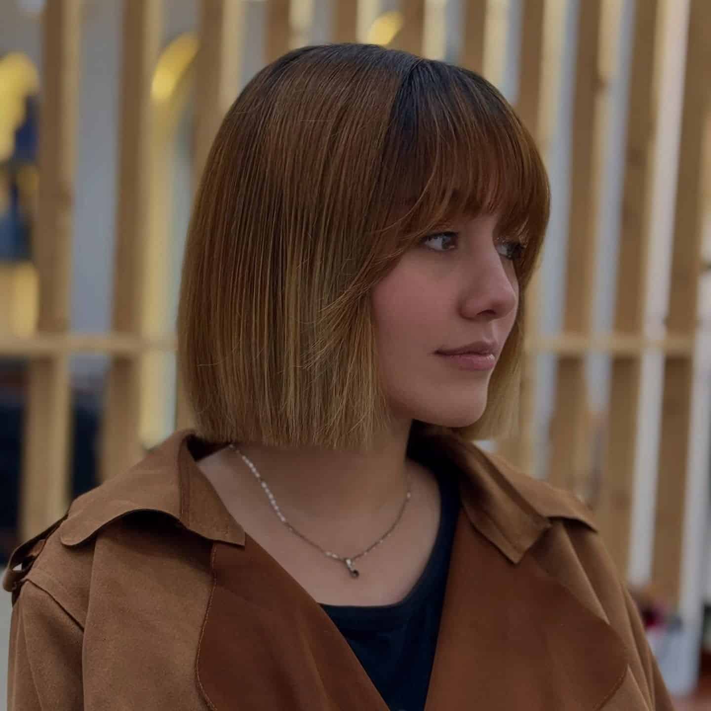 1. Sleek Blunt Bob With Warm Chestnut Brown - Bangs Hairstyles