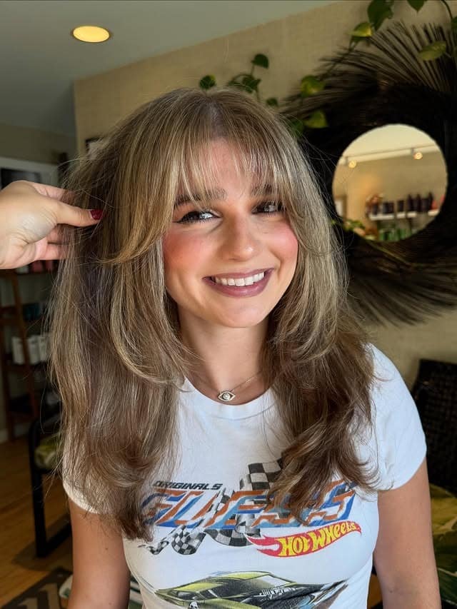 14. Dimensional Honey-Brunette Layers With Full Fringe - Bangs Hairstyles