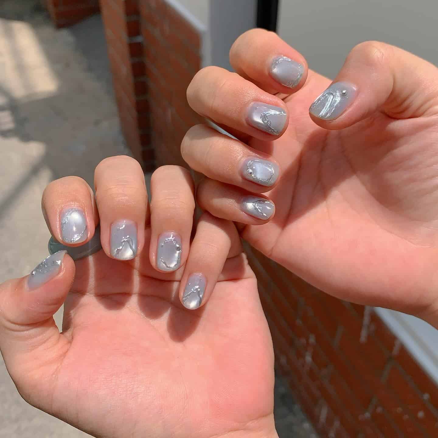 8. Silver Cloud Glow Short Nails - summertime nail ideas