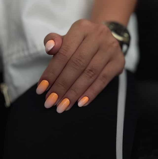 9. Peach Cream Fade Almonds - summertime nail ideas