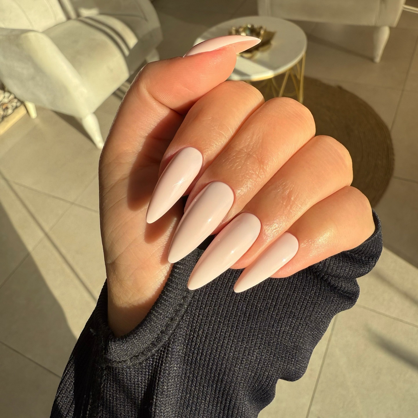 12. Soft Almond Porcelain Stilettos - summertime nail ideas