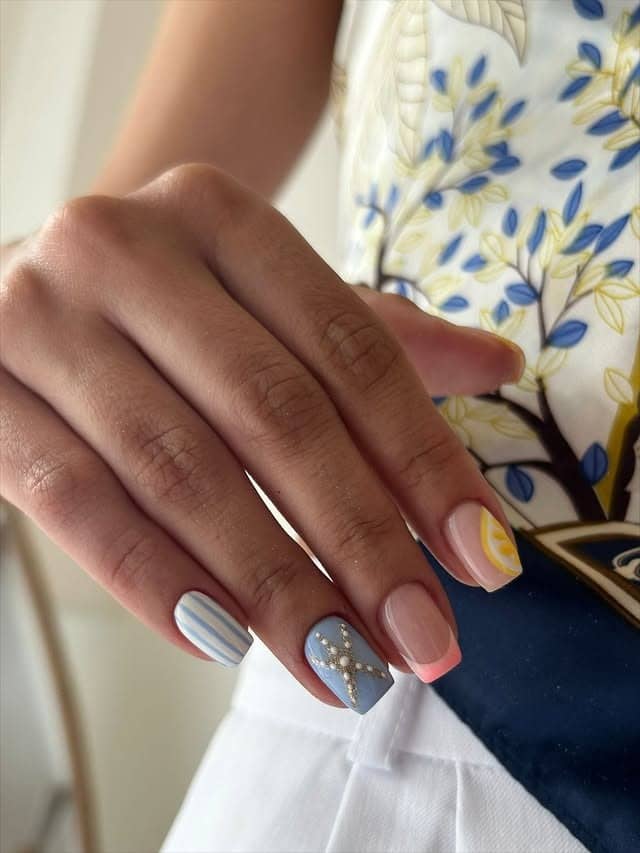 19. Coastal Stripe & Starfish Mix - summertime nail ideas